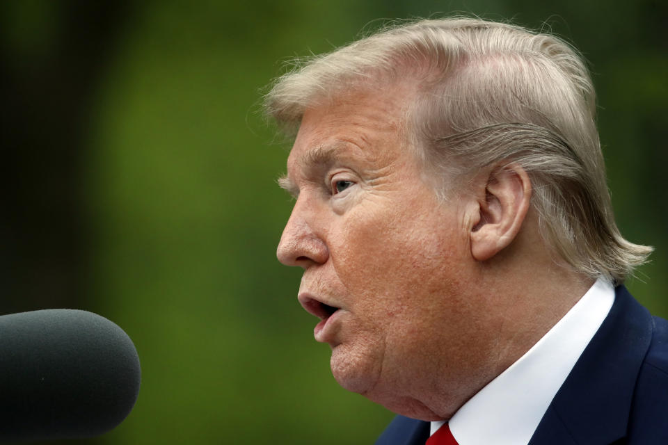 President Donald Trump speaks about the coronavirus in the Rose Garden of the White House, Tuesday, April 14, 2020, in Washington. (AP Photo/Alex Brandon)