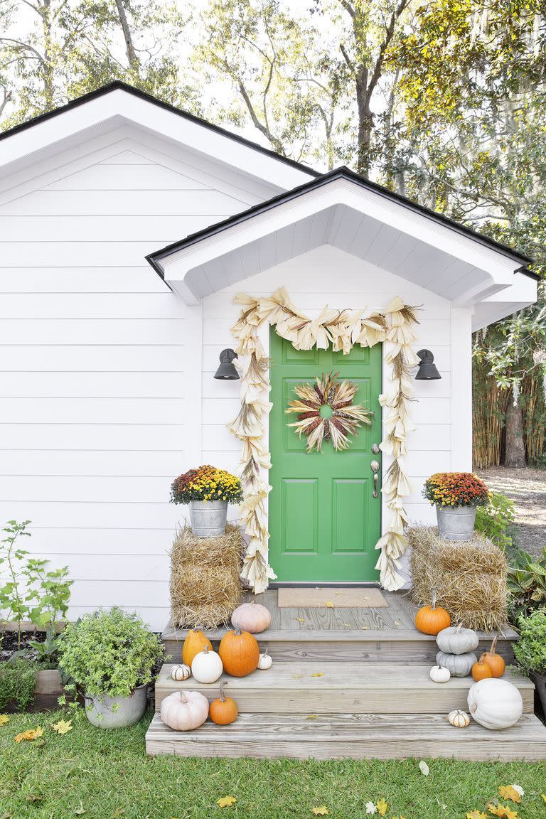 <p>Celebrate the start of the harvest season by going all-out on corn husks. Dress the door with a garland and wreath, made out of corn husks and multi-colored ears of corn — all faux, of course. </p><p><a class="link " href="https://www.amazon.com/WsCrafts-Pcs-Artificial-Corn-Thanksgiving/dp/B07QPGQNB6?tag=syn-yahoo-20&ascsubtag=%5Bartid%7C10055.g.2716%5Bsrc%7Cyahoo-us" rel="nofollow noopener" target="_blank" data-ylk="slk:SHOP ARTIFICIAL CORN">SHOP ARTIFICIAL CORN </a></p><p><strong>RELATED</strong>: <a href="https://www.goodhousekeeping.com/holidays/halloween-ideas/g32948621/halloween-door-decorations/" rel="nofollow noopener" target="_blank" data-ylk="slk:These Stylish Halloween Door Decorations Are Perfect For Fall" class="link ">These Stylish Halloween Door Decorations Are Perfect For Fall</a></p>