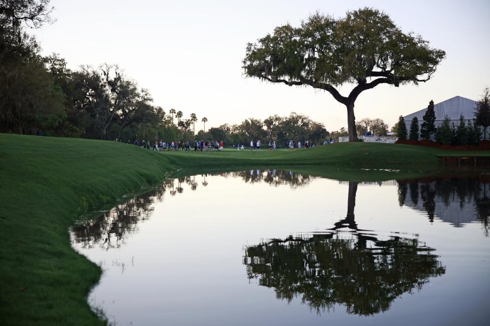 The par-5 ninth hole of the Players Stadium Course features a large lake down the right side of the fairway.