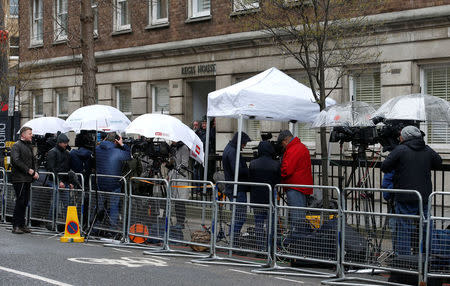 Television crews and other media wait outside the King Edward VII's Hospital where Britain's Prince Philip has been admitted for surgery, in central London, Britain, April 4, 2018. REUTERS/Henry Nicholls