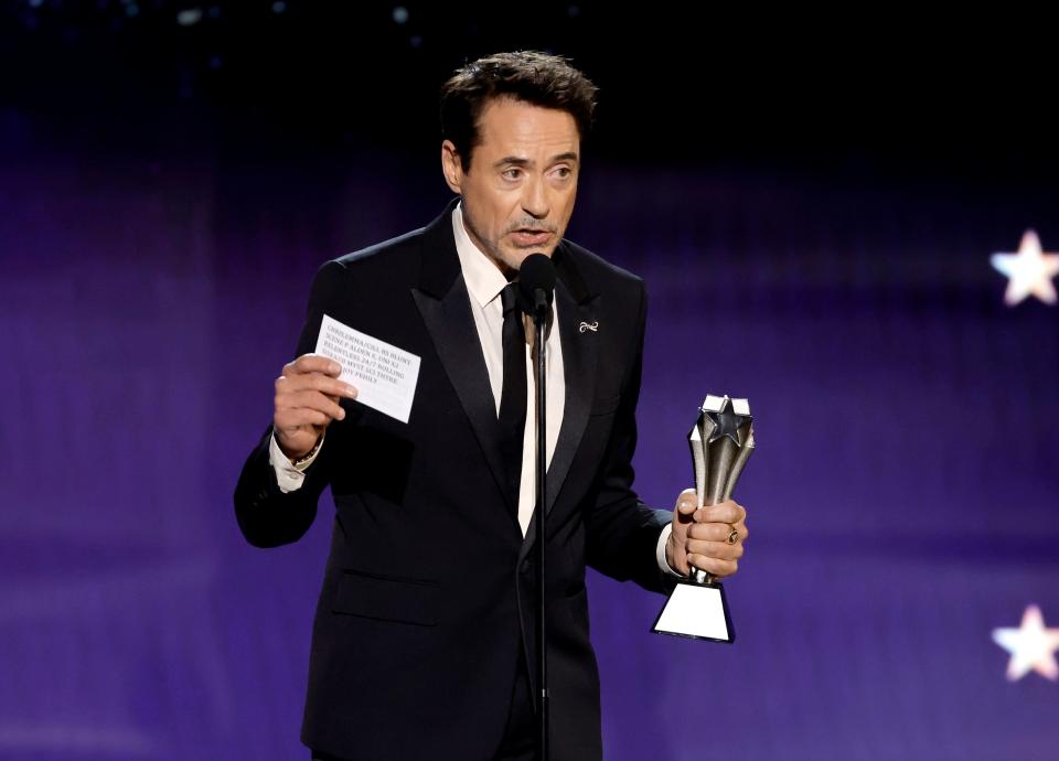 Robert Downey Jr. thanked the Critics Choice Awards for his best supporting actor win by reading their most scathing reviews of his performances.