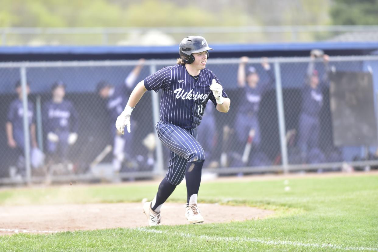 Marysville's Bryce Smith runs to first base during a game last season.