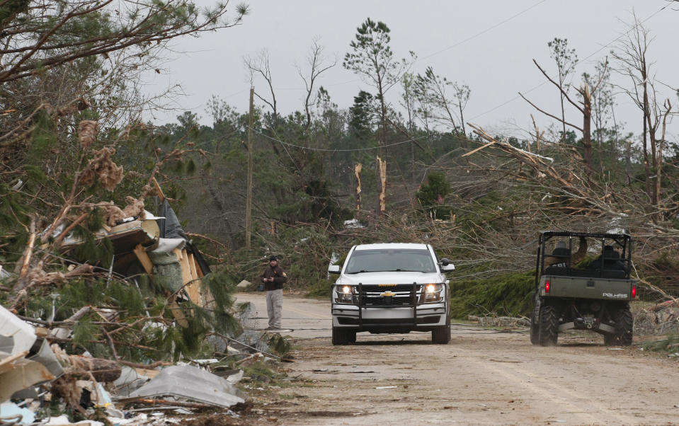 Damage from a tornado which killed at least 23 people is seen as Lee county deputies secure the scene in Beauregard, Alabama on March 4, 2019.  (Photo: Tami Chappell/AFP/Getty Images)