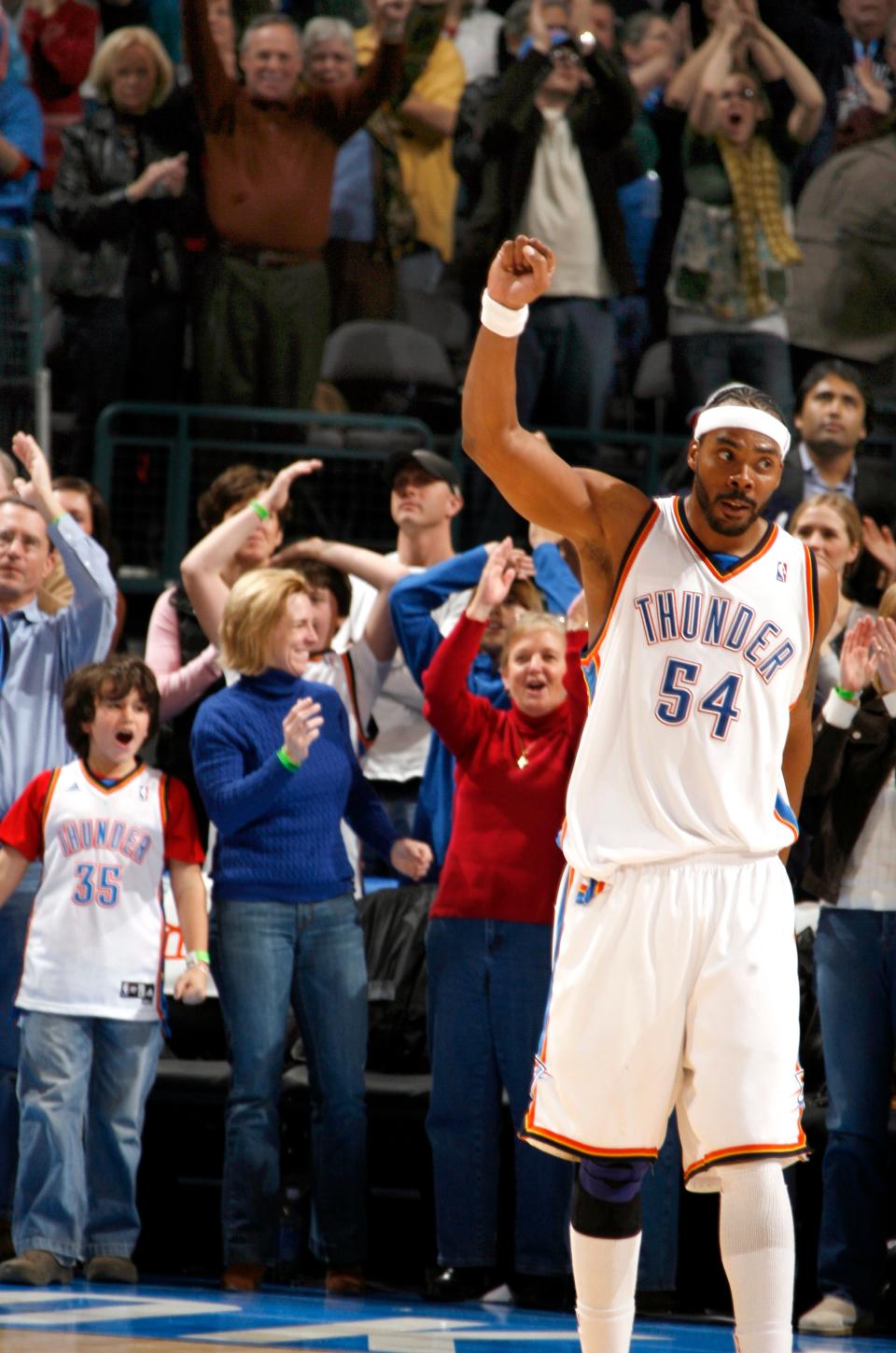 Chris Wilcox (54) celebrates a Thunder win against the Golden State Warriors on Dec. 31, 2008, at the Ford Center in Oklahoma City.