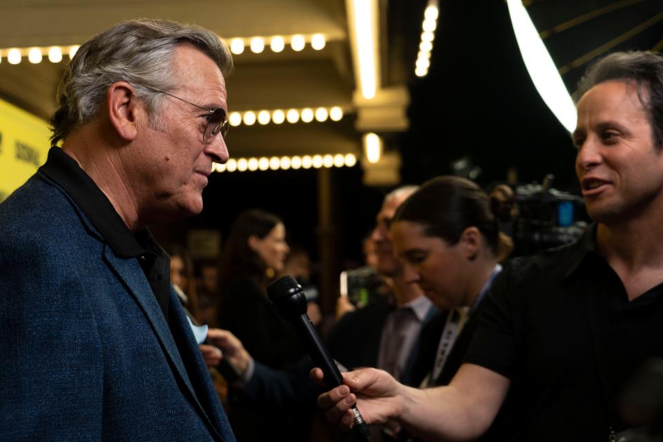 Executive producer Bruce Campbell gets interviewed on the red carpet for the premiere of “Evil Dead Rise” during South by Southwest in 2023.