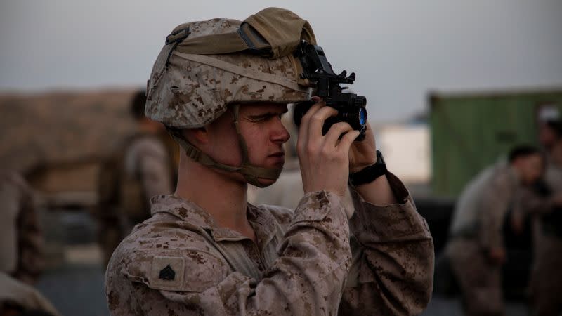 U.S. Marines assigned to Special Purpose Marine Air-Ground Task Force-Crisis Response-Central Command 19.2 prepare to deploy to reinforce Baghdad's U.S. embassy from a base in Kuwait