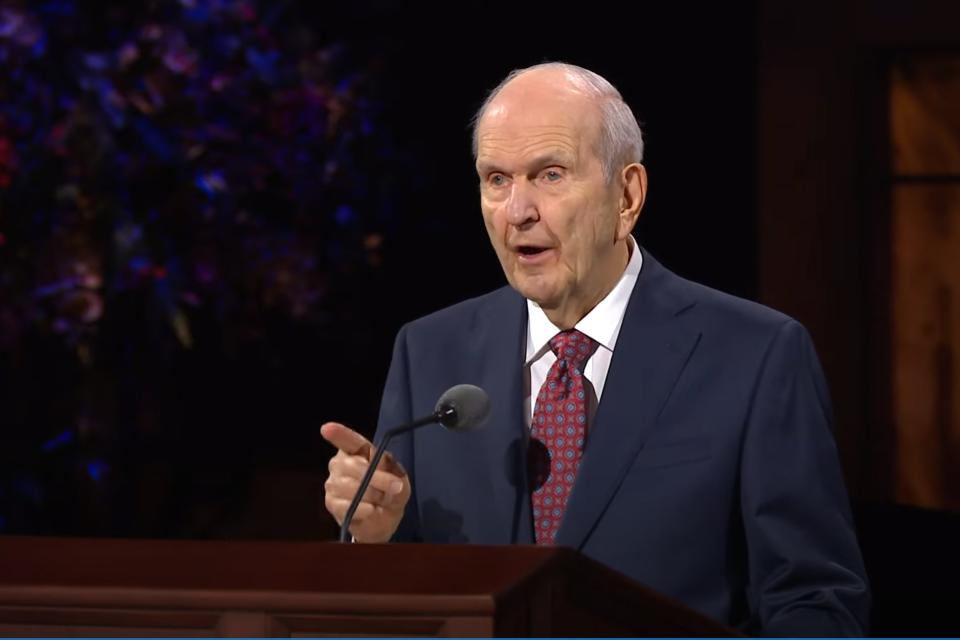 In this Saturday, Oct. 3, 2020, video image streamed by The Salt Lake Temple of The Church of Jesus Christ of Latter-day Saints, church President Russell M. Nelson speaks during the opening of the 190th Semiannual General Conference at the Conference Center Theater on Temple Square in Salt Lake City. The twice-annual conference kicked off Saturday without anyone attending in person and top leaders sitting some 6-feet apart inside an empty room as the faith takes precautions to avoid the spread of the coronavirus. A livestream of the conference showed a few of the faith's top leaders sitting alone inside a small auditorium in Salt Lake City, Normally, top leaders sit side-by-side on stage with the religion's well-known choir behind them and some 20,000 people watching. (The Church of Jesus Christ of Latter-day Saints via AP)