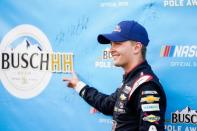 May 23, 2019; Concord, NC, USA; Monster Energy NASCAR Cup Series driver William Byron (24) celebrates winning the Busch pole during qualifying for the Coca-Cola 600 at Charlotte Motor Speedway. Mandatory Credit: Jim Dedmon-USA TODAY Sports