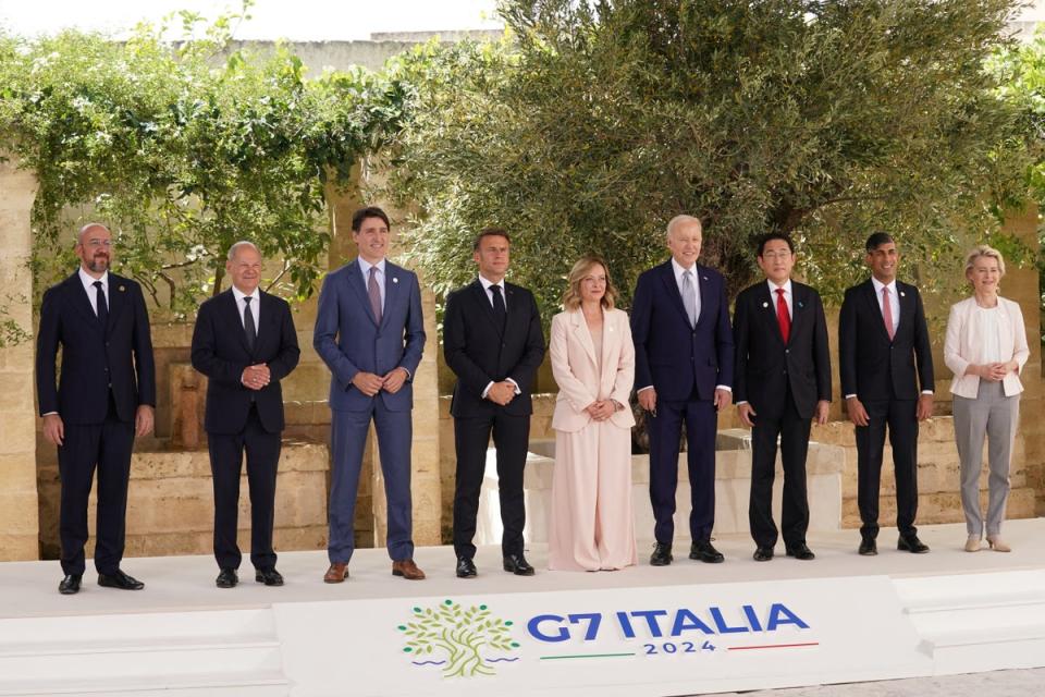 Giorgia Meloni (centre) with President of the European Council Charles Michel (left), Olaf Scholz, Justin Trudeau, Emmanuel Macron, Joe Biden, Fumio Kishida, Rishi Sunak and European Commission President Ursula von der Leyen at the G7 summit in Savelletri, Italy (Reuters)