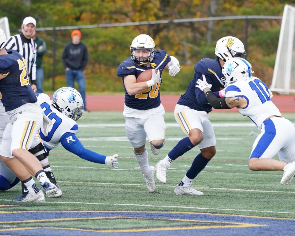 Siena Heights' Ethan LoPresto carries the ball during Saturday's game against Lawrence Tech.