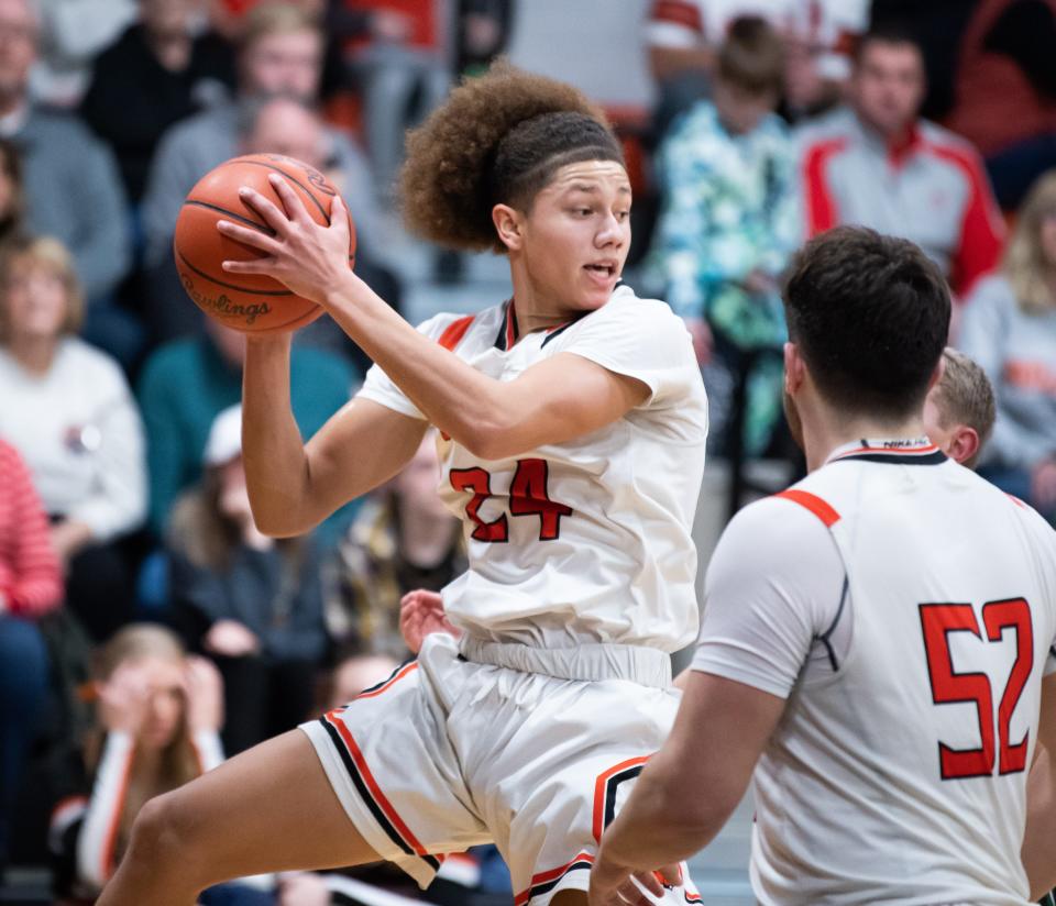 Kyrie Gaut hauls down a rebound for Dalton.