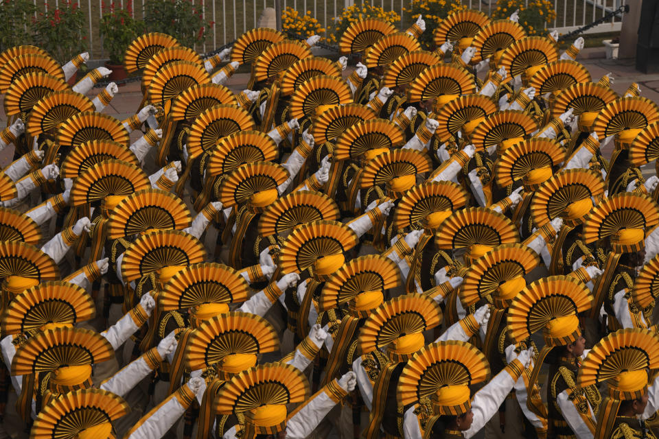 Indian defense forces march on the ceremonial street Kartavyapath boulevard during India's Republic Day parade celebrations in New Delhi, India, Friday, Jan. 26, 2024. (AP Photo/Manish Swarup)