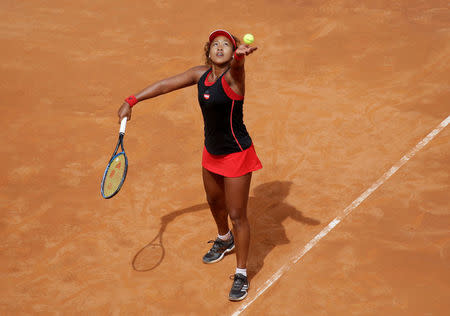 FILE PHOTO: Tennis - WTA Premier 5 - Italian Open - Foro Italico, Rome, Italy - May 14, 2018 Japan's Naomi Osaka in action during her first round match against Belarus' Victoria Azarenka REUTERS/Max Rossi