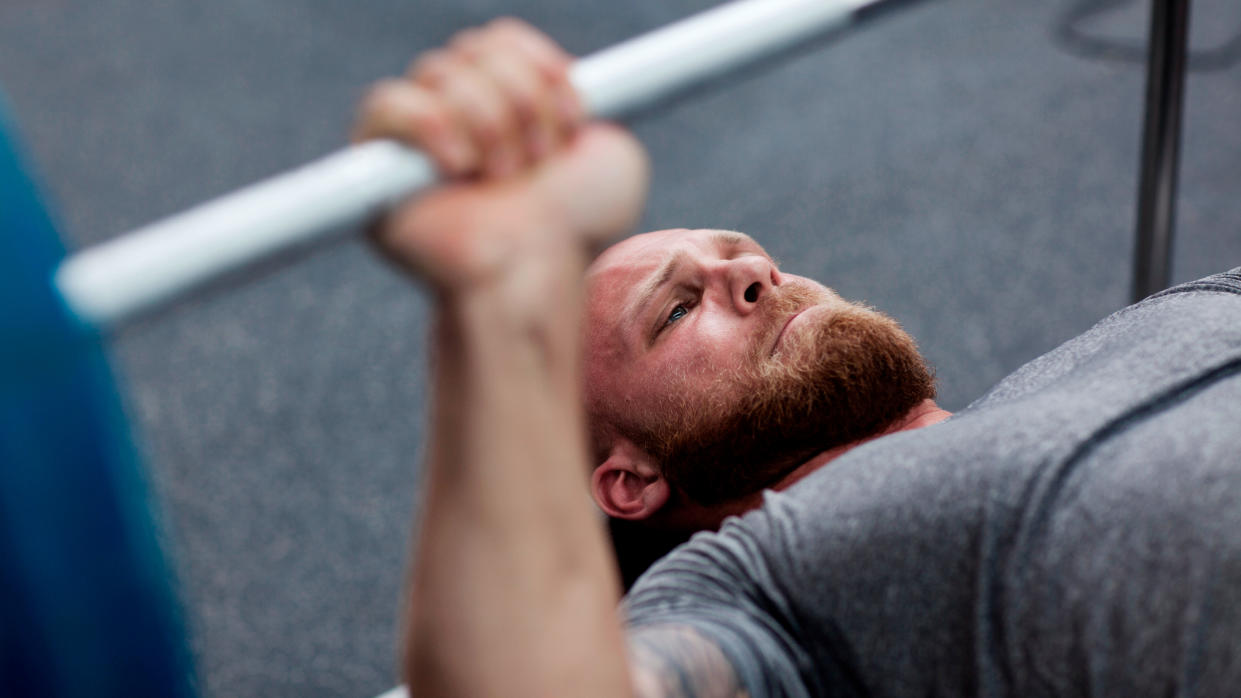  Man performing bench press 