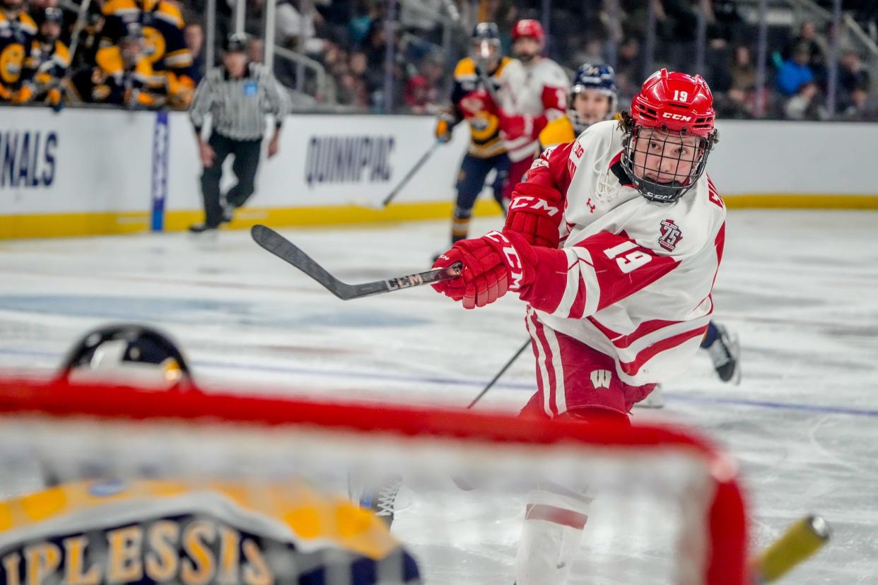 Wisconsin's Quinn Finley ties the game against Quinnipiac on Friday night, forcing overtime.