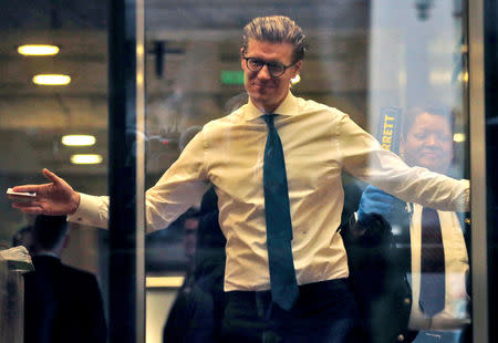 Alex van der Zwaan goes through security at the U.S. District Court after arriving for his sentencing in Washington, D.C., U.S., April 3, 2018. Reuters photographer Leah Millis: "Everyone has to go through security, no matter who you are. He seemed to embrace the inevitable as the woman with the wand asked him to turn around, facing him back towards the doors where many of the news media were still gathered." REUTERS/Leah Millis