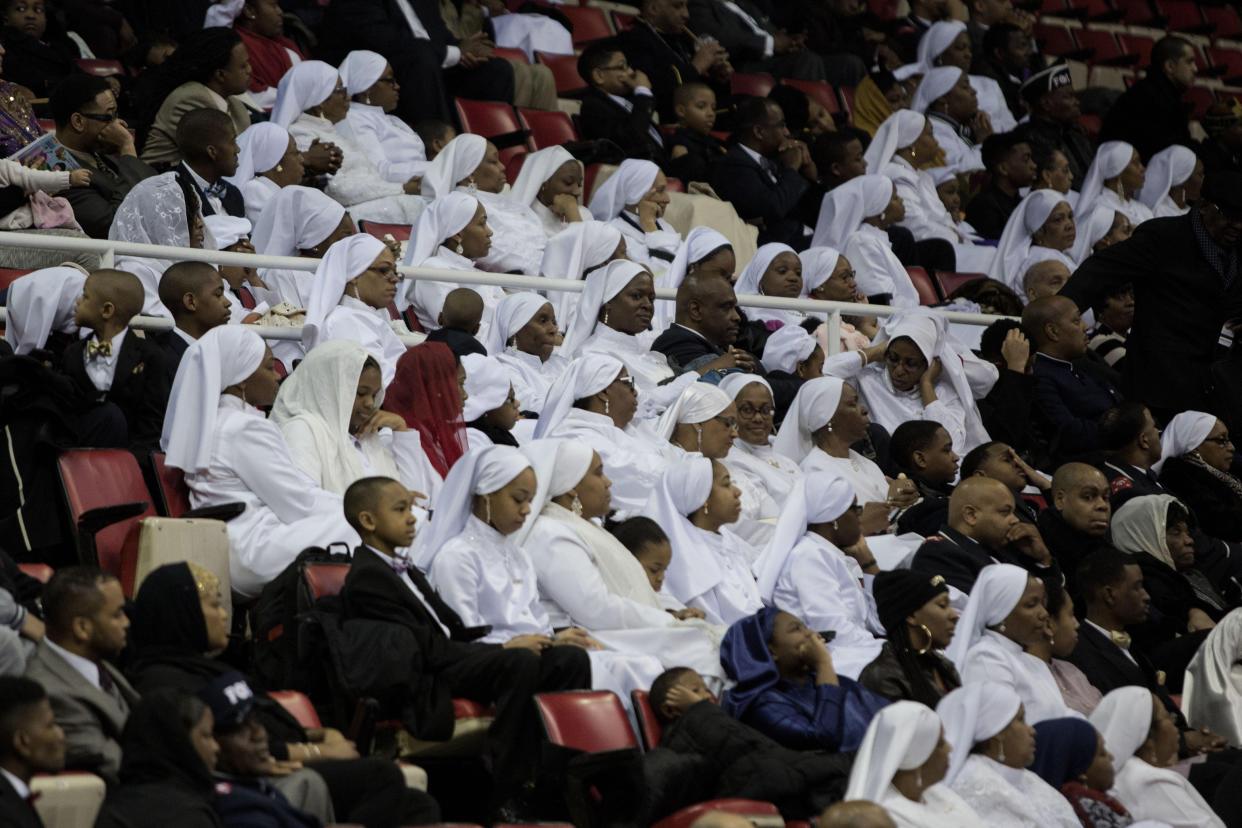 Members of the audience listen to Minister Louis Farrakhan speak at the Nation of Islam Saviours' Day Convention at Joe Louis Arena in Detroit on Feb. 19, 2017.
