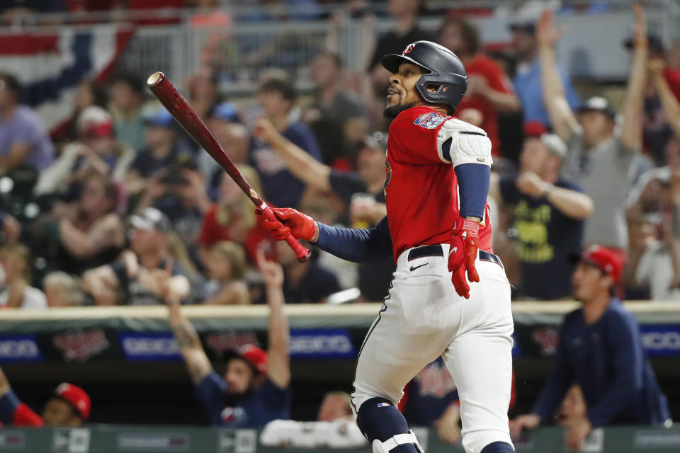 Minnesota Twins' Byron Buxton watches his two-run home run against the Baltimore Orioles during the ninth inning of a baseball game Friday, July 1, 2022, in Minneapolis. The Twins won 3-2. (AP Photo/Bruce Kluckhohn)