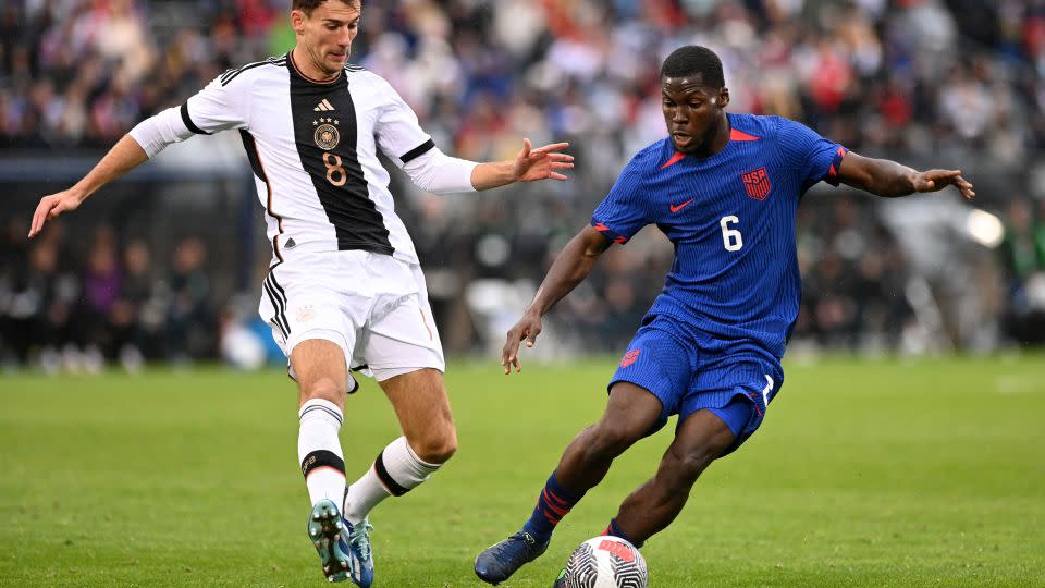 Musah, representing the US, battles with Germany's Leon Goretzka in an international friendly match last year. - Mike Lawrence/ISI Photos/USSF/Getty Images