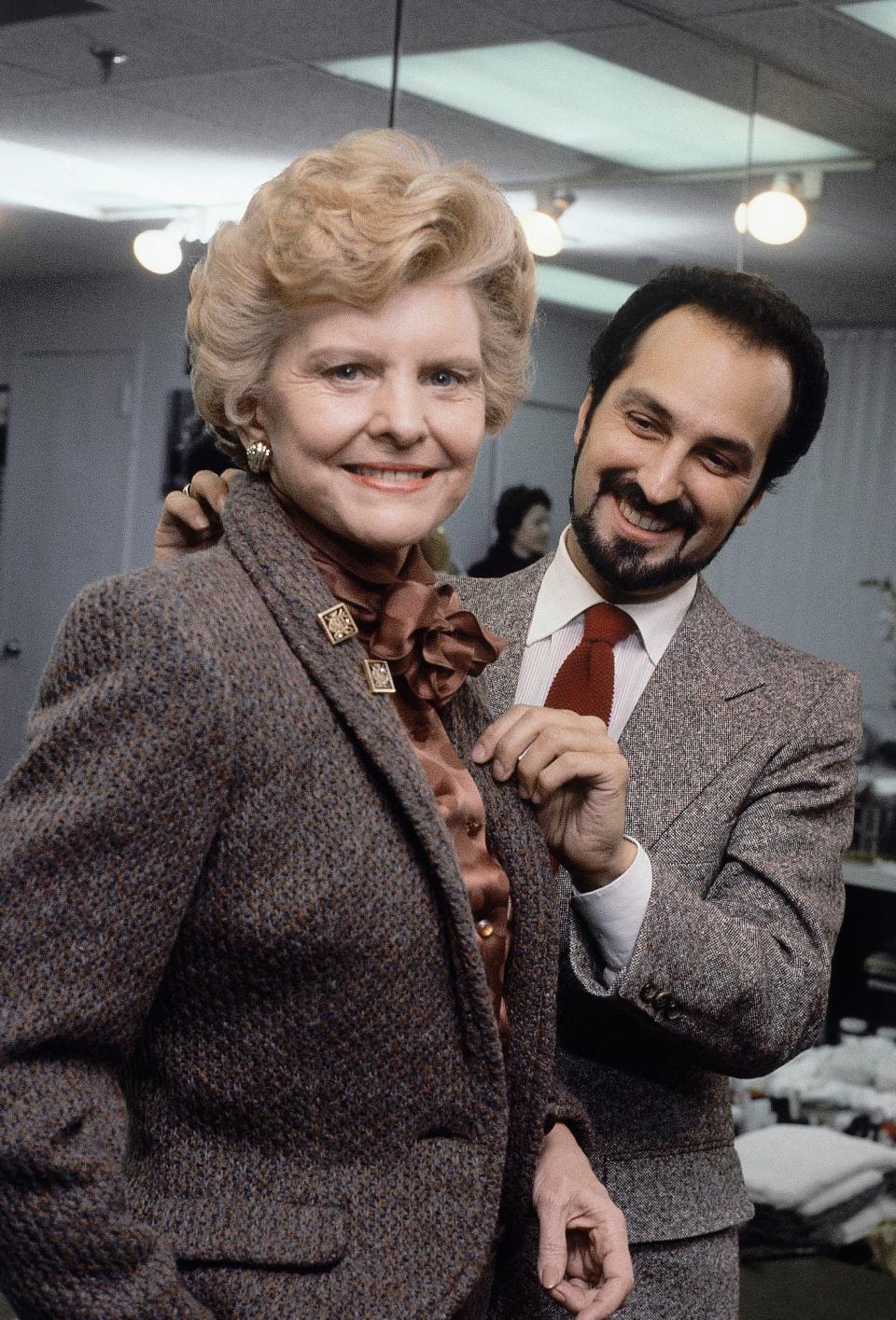 betty ford being fitted for a coat by designer albert capraro in 1981