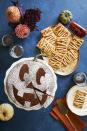 <p>For a simple sweet, bake a richly spiced pumpkin cake, then use a jack-o'-lantern stencil to decorate with confectioners' sugar.</p><p>Get the <a href="https://www.countryliving.com/food-drinks/a33944277/spiced-pumpkin-molasses-cake/" rel="nofollow noopener" target="_blank" data-ylk="slk:Spiced Pumpkin-Molasses Cake recipe;elm:context_link;itc:0;sec:content-canvas" class="link "><strong>Spiced Pumpkin-Molasses Cake recipe</strong></a> from Country Living.</p><p><strong>RELATED: </strong><a href="https://www.goodhousekeeping.com/food-recipes/dessert/g4547/pumpkin-cake-recipes/" rel="nofollow noopener" target="_blank" data-ylk="slk:21 Pumpkin Cakes That Celebrate Fall in the Best Way;elm:context_link;itc:0;sec:content-canvas" class="link ">21 Pumpkin Cakes That Celebrate Fall in the Best Way</a><br></p>