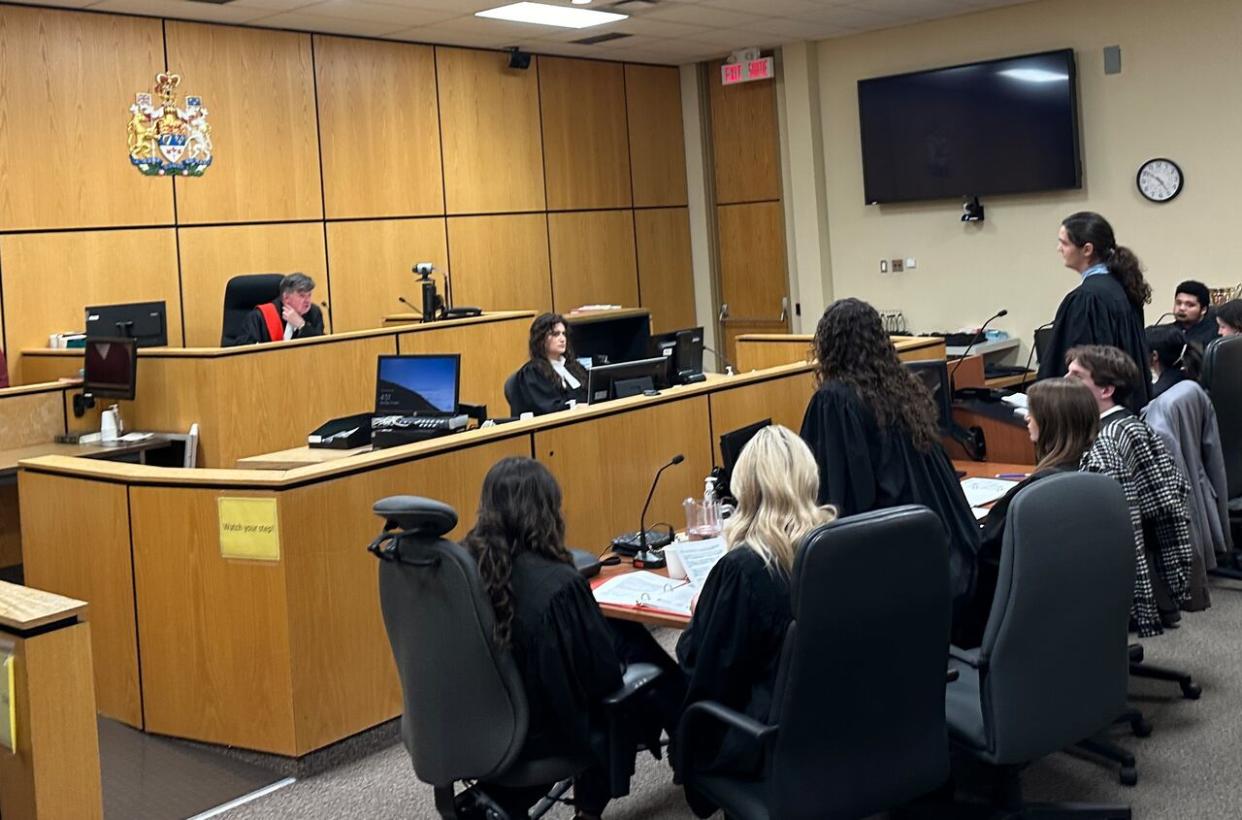 High school students take on the roles of Crown and defence attorneys as part of mock trials at the Superior Court of Justice in Windsor. (Dalson Chen/CBC - image credit)