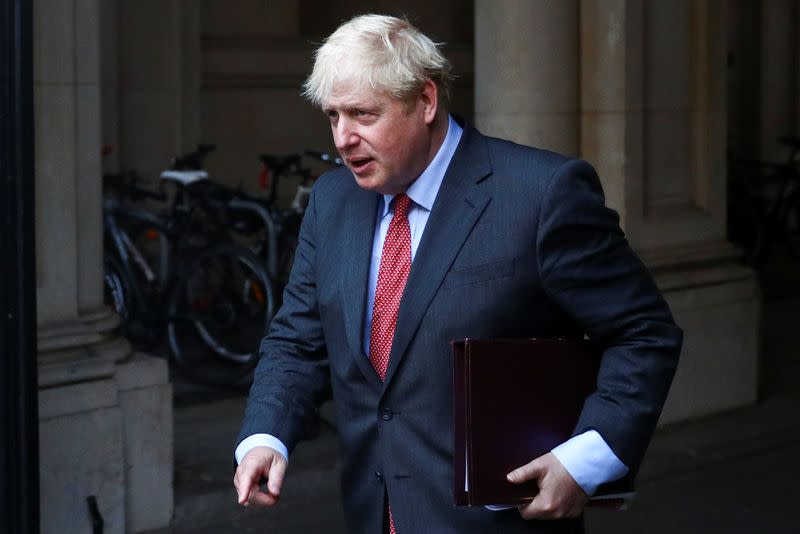 Britain's Prime Minister Boris Johnson leaves after a cabinet meeting, in London