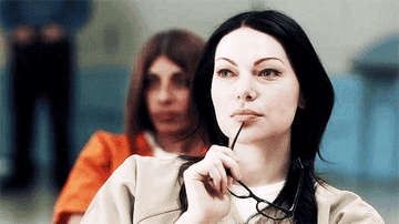 Alex from "Orange Is the New Black" in a prison uniform