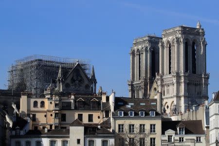 A view shows Notre-Dame Cathedral after a massive fire devastated large parts of the gothic structure in Paris, France, April 17, 2019. REUTERS/Gonzalo Fuentes