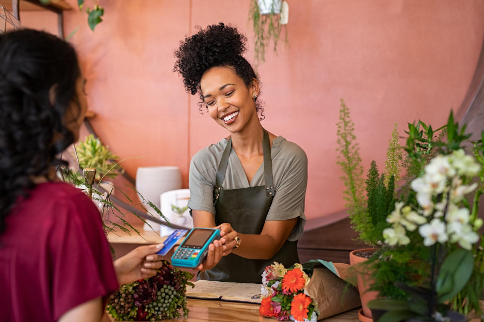 Making credit card payments is crucial when it comes to improving your credit score. According to LendingTree, on-time payments can account for up to 35% of your credit history. (Credit: Getty Creative)