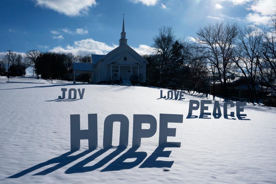 Bethlehem United Methodist Church in Lebanon, Tenn., offers words of "hope, joy, love and peace" on its snow-covered front lawn Tuesday, Jan. 16, 2024.