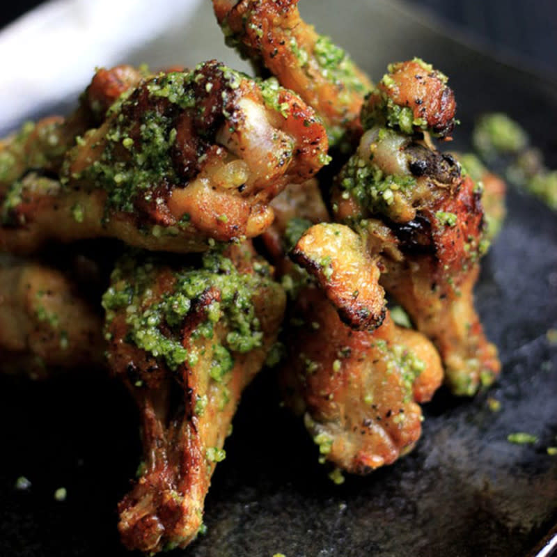 <p>My PCOS Kitchen</p><p>Share these amazing chicken wings with the family and coat them with a delicious pesto sauce for amazing flavor!</p><p><strong>Get the recipe: <a href="https://www.mypcoskitchen.com/pesto-chicken-wings/" rel="nofollow noopener" target="_blank" data-ylk="slk:Pesto Chicken Wings;elm:context_link;itc:0;sec:content-canvas" class="link rapid-noclick-resp">Pesto Chicken Wings</a></strong></p>