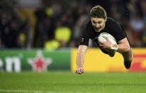 Beauden Barrett of New Zealand scores a try during their Rugby World Cup final match against Australia at Twickenham in London, Britain, October 31, 2015. REUTERS/Dylan Martinez