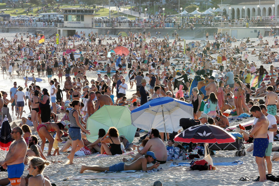 Hundreds of people gather at Sydney's Bondi Beach despite the threat of coronavirus.