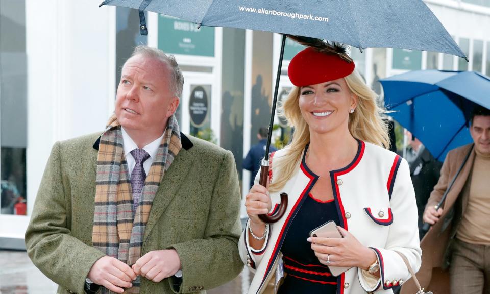 <span>Doug Barrowman and Michelle Mone at the Cheltenham Festival.</span><span>Photograph: Max Mumby/Indigo/Getty Images</span>