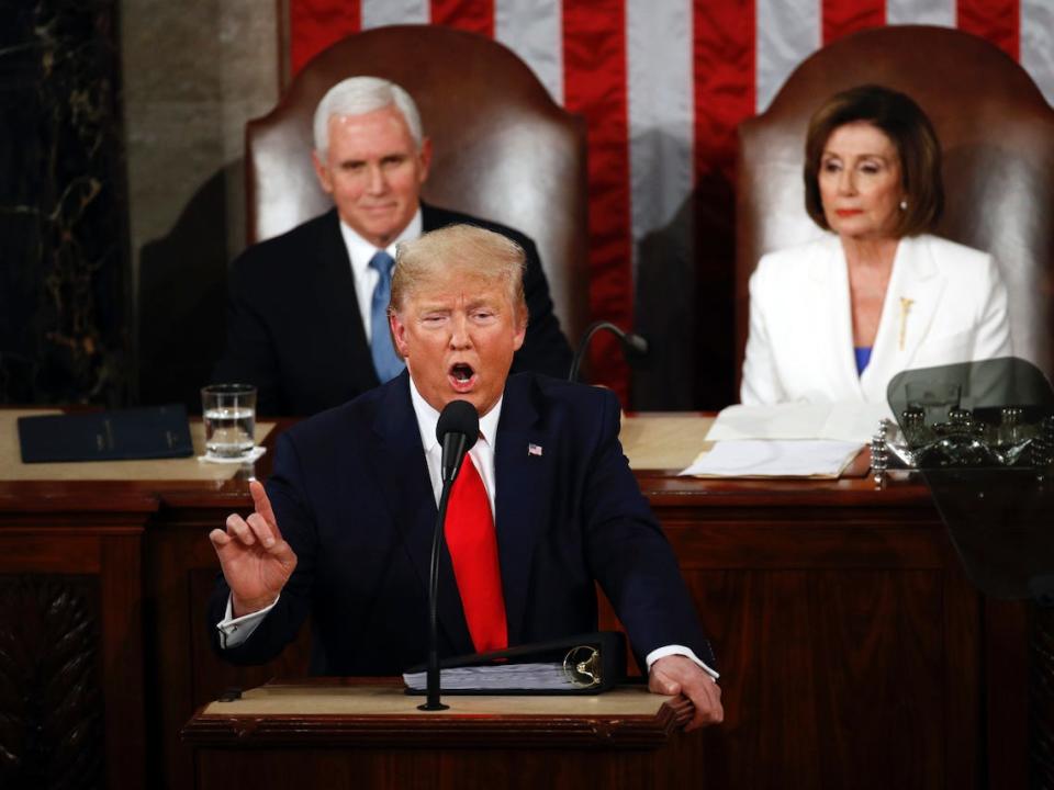 President Donald Trump delivers his State of the Union address to a joint session of Congress on Capitol Hill in Washington, Tuesday, Feb. 4, 2020, as Vice President Mike Pence and House Speaker Nancy Pelosi, D-Calif., watch.