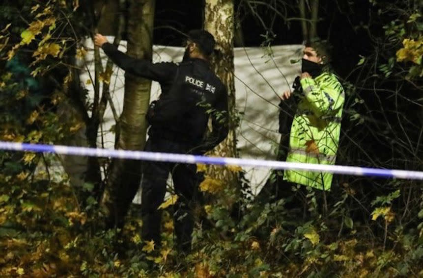 Police at the scene in woodland in Moston, Manchester. (Reach)