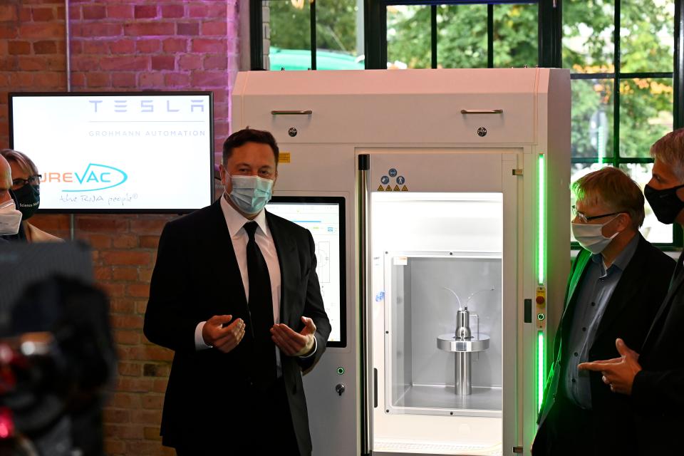 Futurist entrepreneur Elon Musk presents a RNA printer, essentially a vaccine production device, on the sidelines of a meeting with the leadership of the conservative CDU/CSU parliamentary group in Berlin on September 2, 2020. - The RNA printer is jointly developped by biopharmaceutical company CureVac and Tesla Grohmann Automation, a world-leader in highly automated methods of manufacturing. (Photo by Tobias SCHWARZ / various sources / AFP) (Photo by TOBIAS SCHWARZ/POOL/AFP via Getty Images)