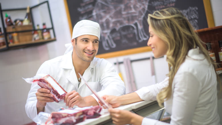 butcher helping a customer