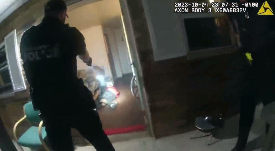 After Michael Frierson became agitated and aggressive on Oct. 4, his sister called 911 to help the 36-year-old diagnosed with schizophrenia experiencing a mental health crisis. Police shot Frierson after they say he swung an object at them. Screen grab from police body cam.