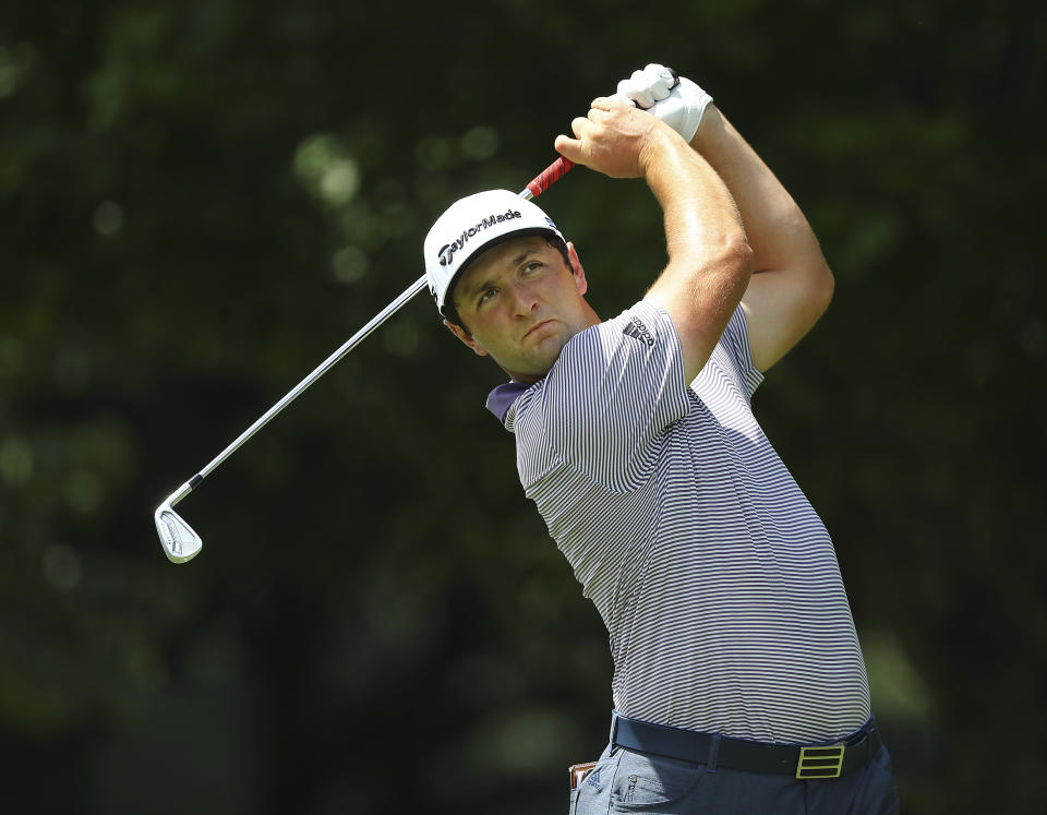 Jon Rahm, ranked second behind Dustin Johnson in FedEx Cup points, tees off on the par-3 11th hole during his practice round for the season-ending Tour Championship at East Lake Golf Club on Wednesday, Sept. 2, 2020, in Atlanta. (Curtis Compton/Atlanta Journal-Constitution via AP)