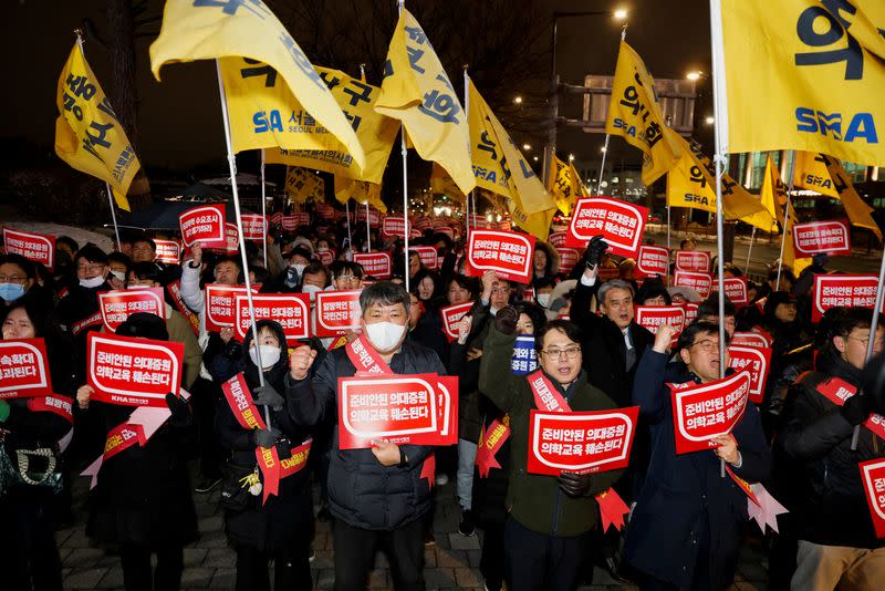 Doctors take part in a protest against a plan to admit more students to medical school, in front of the Presidential Office in Seoul