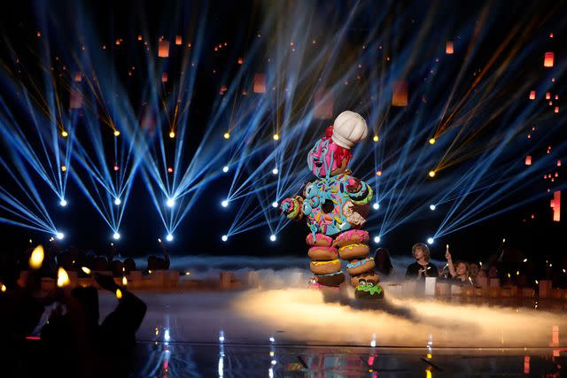 <p>Michael Becker/FOX</p> John Schneider as Donut on 'The Masked Singer'