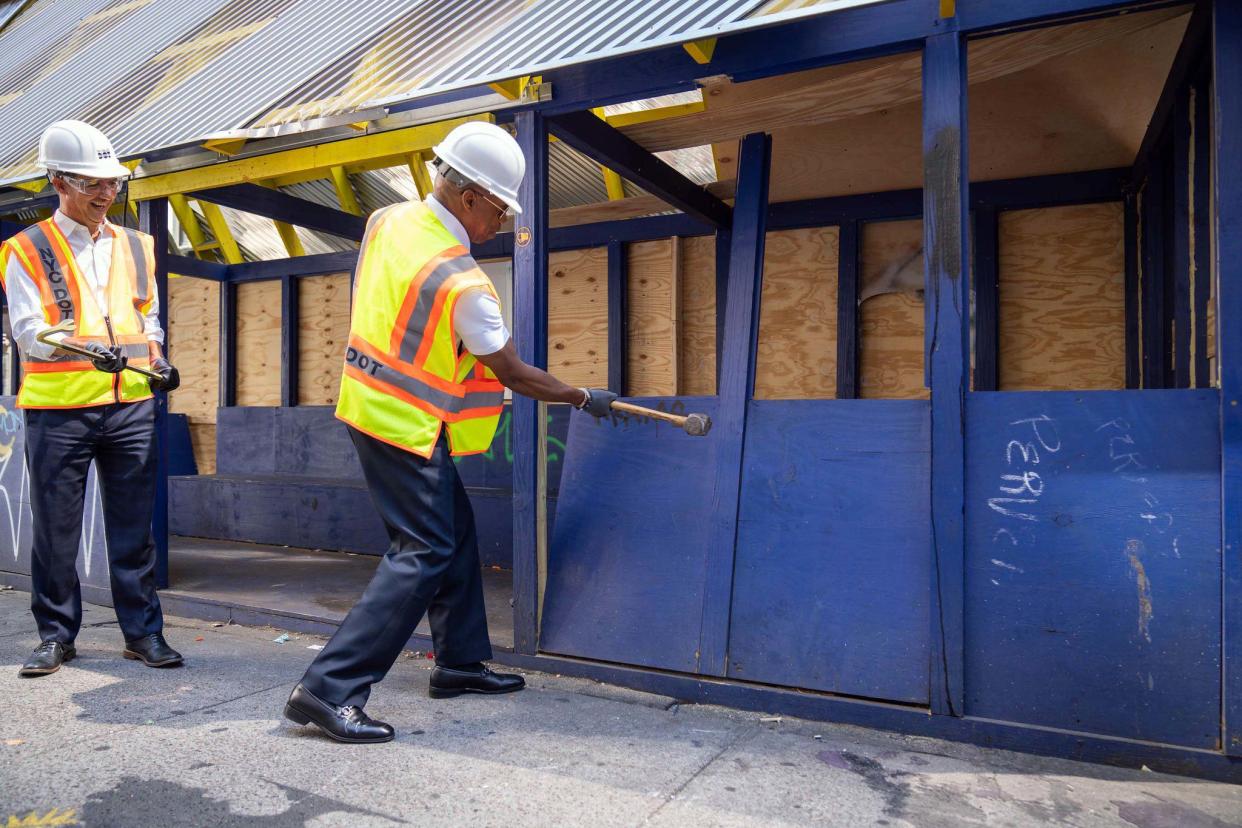 New York City Mayor Eric Adams takes a sledgehammer to abandoned outdoor dining shed in Manhattan, New York on Thursday, Aug 18, 2022.