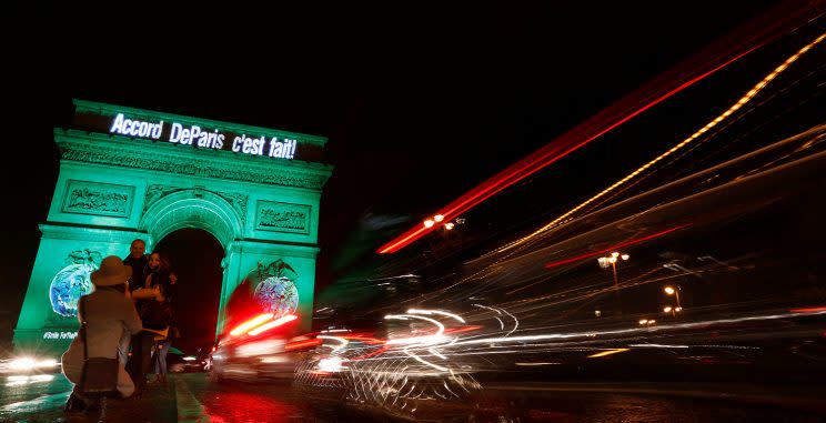 Special lighting on the Arc de Triomphe celebrates the Paris climate change agreement