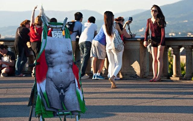 Full frontal aprons are an easy sell for the swarms of visitors to some of Italy's most picturesque attractions - www.alamy.com