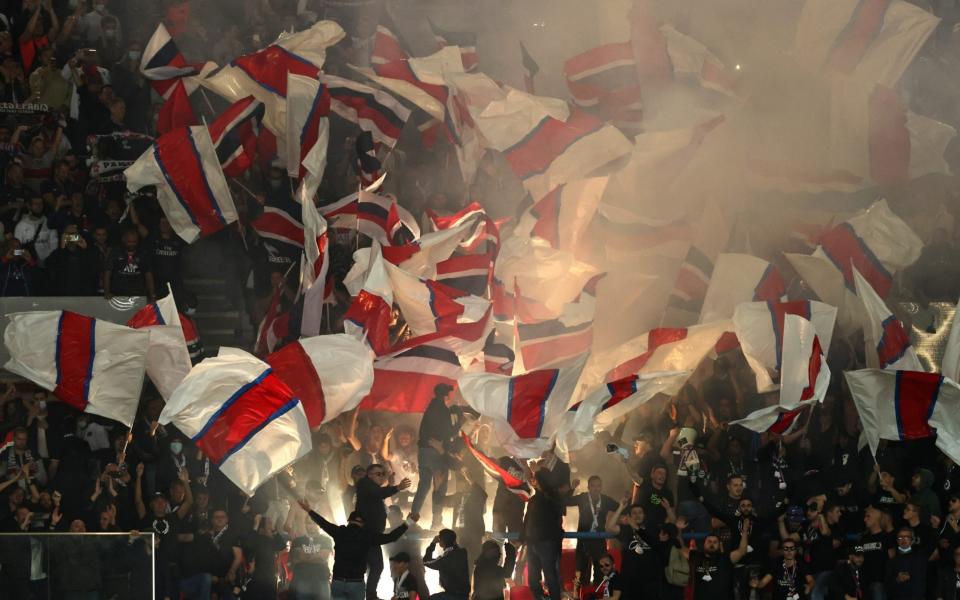 Paris Saint-Germain fans show their support during the UEFA Champions League group A match between Paris Saint-Germain and Manchester City at Parc des Princes on September 28, 2021 in Paris - Marc Atkins/Getty Images