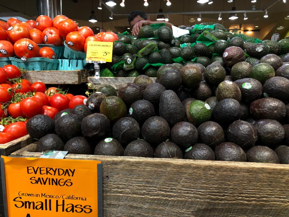 Avocados and tomatoes from Mexico are seen for sale in a store on June 6, 2019 in Washington,DC. - US President Donald Trump has trumpeted the robust US economy but hitting all products from Mexico with 25 percent tariffs threatens to undercut growth and undermine key American industries, economists warn. Tomatoes and avocados -- nearly 90 percent of which come from Mexico and other seasonal fruits would be hit hard. (Photo by Anna-Rose GASSOT / AFP)        (Photo credit should read ANNA-ROSE GASSOT/AFP/Getty Images)
