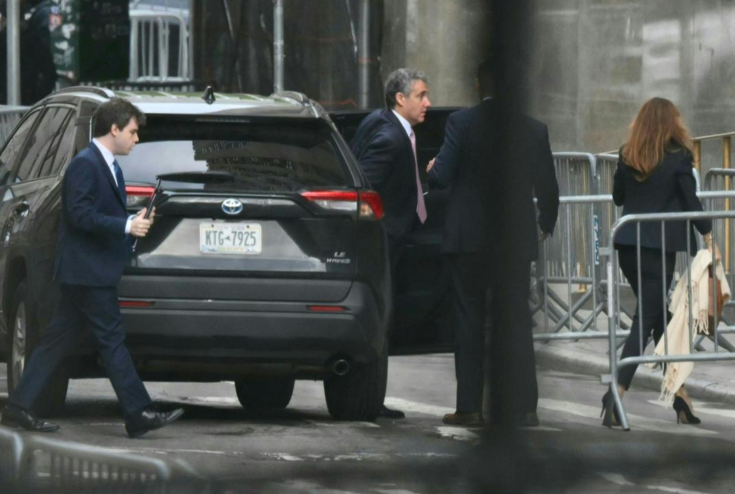 Michael Cohen stepping out of a car outside the Manhattan Criminal Courthouse on Monday.