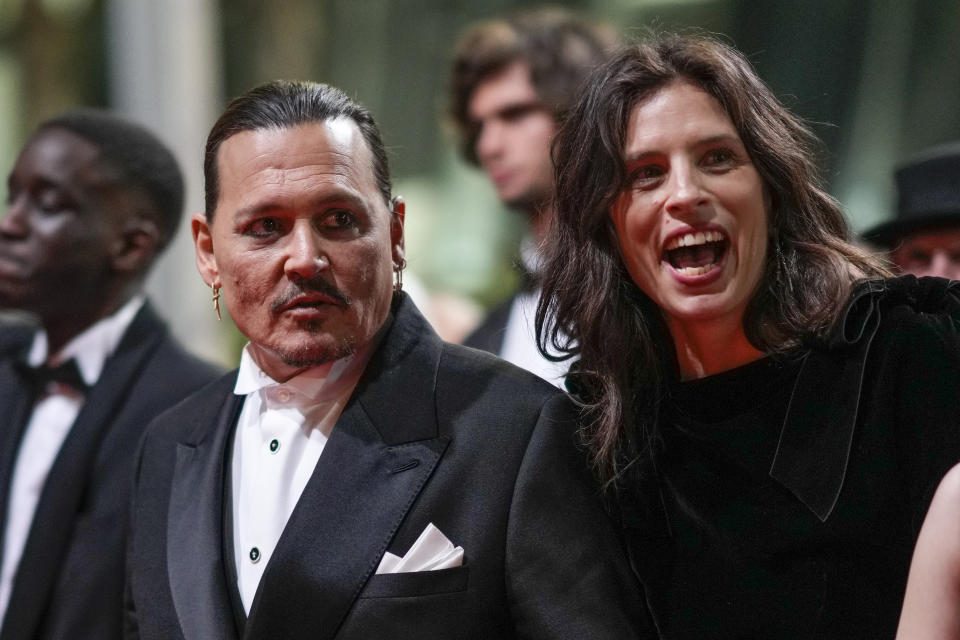 Johnny Depp, left, and director Maiwenn pose for photographers upon departure from the premiere of the film 'Jeanne du Barry' at the 76th international film festival, Cannes, southern France, Tuesday, May 16, 2023. (Photo by Scott Garfitt/Invision/AP)